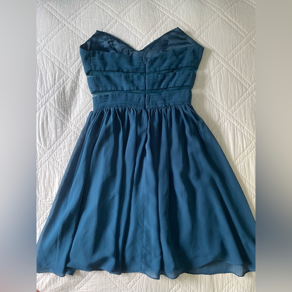 Flowy blue skater dress with mesh bodice detail